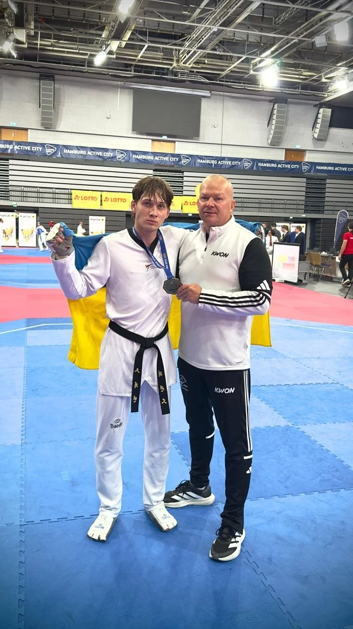 Еміль із тренером-секундантом Валерієм Брунсом після перемоги на German Open 2026